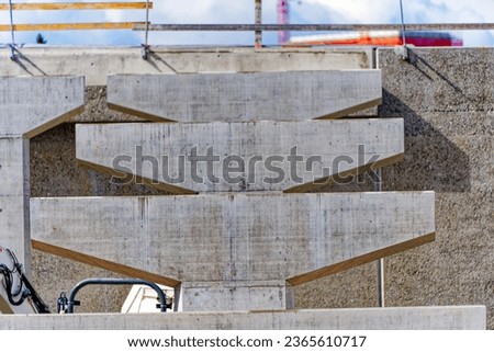 Close-up of concrete piers of ramp at highway enclosure construction site at Swiss City of Zürich on a blue cloudy autumn day. Photo taken September 23rd, 2023, Zurich, Switzerland.