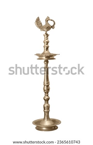 Brass peacock standing oil lamp isolated on a white background... Royalty-Free Stock Photo #2365610743