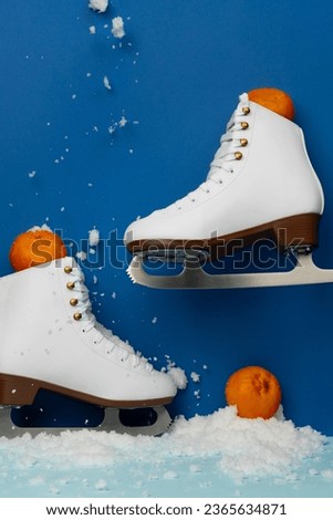 Ice skates. white skates. ice skate shoes. ice skating. figure skates. ice skating shoes. Pair of Figure Skates. winter sport. space for text, copy space. Skating Equipment. Skating accessories.
