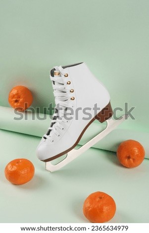 Ice skates. white skates. ice skate shoes. ice skating. figure skates. ice skating shoes. Pair of Figure Skates. winter sport. space for text, copy space. Skating Equipment. Skating accessories.