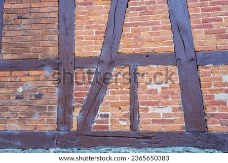 
a facade of an old half-timbered house in Germany
