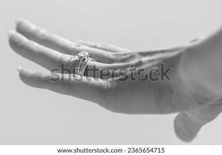 Symbol of Love Wedding and Engagement Ring on a Woman's Hand