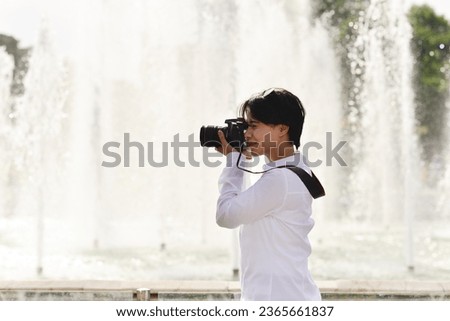 female photographer doing photo shoots