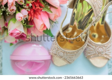Elegant wedding rings on a book, a symbol of love and commitment. Ideal for wedding invitations and romantic designs. Wedding Rings 
 Love Commitment Romantic Symbol Wedding Bridal Shoes Photography