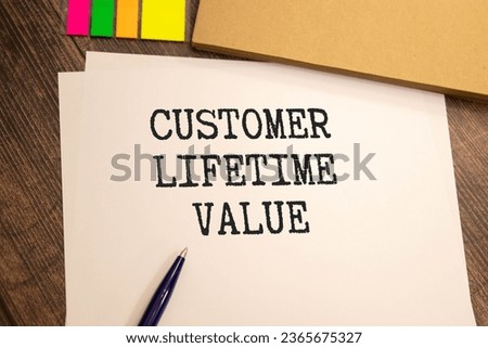 Customer Lifetime Value - handwritten text in a notebook on a desk - 3d render illustration