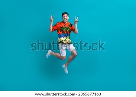 Full body length photo of good mood crazy guy brunet hair show double v sign fingers beach party positive isolated on blue color background