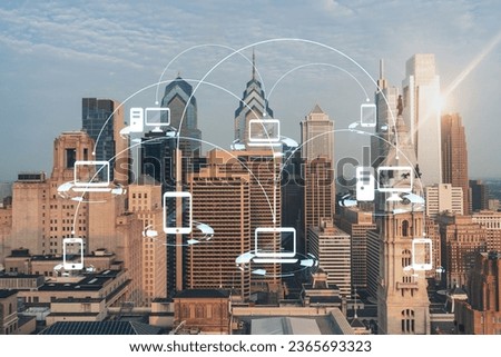 Aerial panoramic cityscape of Philadelphia financial downtown, Pennsylvania, USA. City Hall Clock Tower, sunrise. Social media icons. The concept of networking and establishing people connections