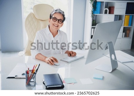 Photo of happy smiling lady professional dressed white shirt texting emails modern gadget indoors workstation workshop