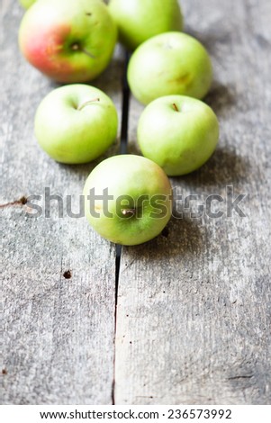 Apples on wooden background - processing still life effect style pictures