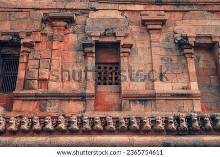 beautiful shot photo of hindu worship tower vimana intricate limestone granite stone statues ancient city tanjore big temple india architecture tamilnadu tourism chola dynasty shrine God goddesses 