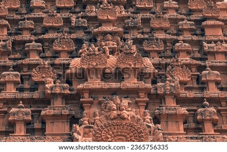 beautiful shot photo of hindu worship tower vimana intricate limestone granite stone statues ancient city tanjore big temple india architecture tamilnadu tourism chola dynasty shrine God goddesses 