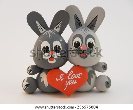 Wooden toy two lovers are kept hare heart symbol couples