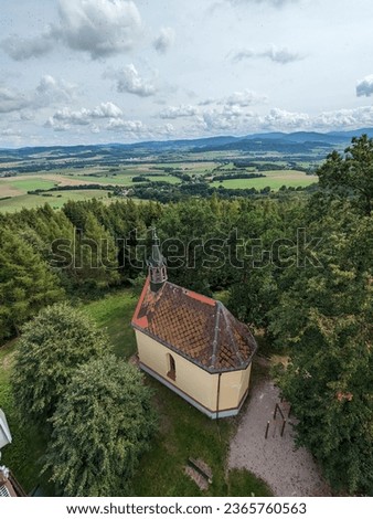 Margaret tower (Rozhledna sv. Marketa) close to Dlazovice,Klatovy, aerial panorama landscape view of lookout tower and small chapel next to it,Sumava mountains