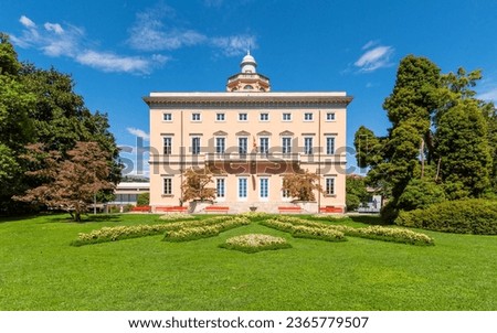 Historic orange Villa Ciani front view in Parco Civico public garden in Lugano Ticino Switzerland Royalty-Free Stock Photo #2365779507