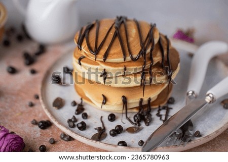 chocolate is spread on the pancake