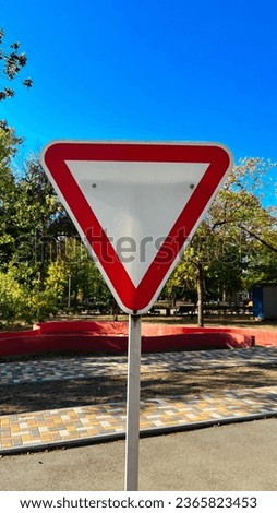 road sign in a city park.