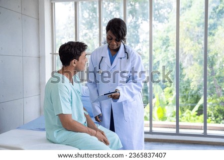 Female doctor and male patient Talk and give advice about the illnesses of patients in the hospital
