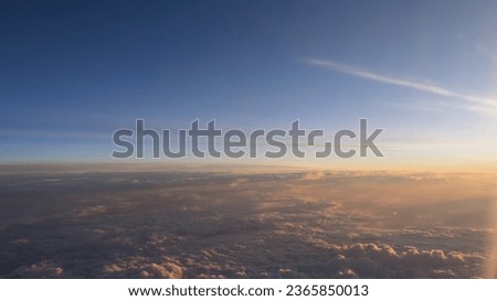 Fly above the clouds during sunrise