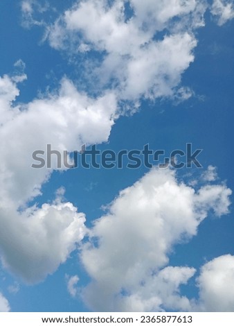 A beautiful view of clouds floating freely in the blue sky 