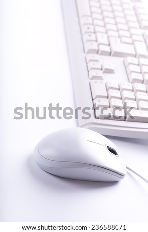 white working place with keyboard and mouse
