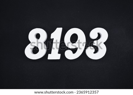 Black for the background. The number 8193 is made of white painted wood.