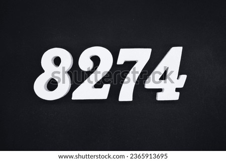 Black for the background. The number 8274 is made of white painted wood.