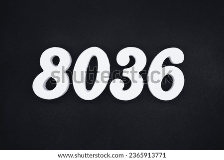 Black for the background. The number 8036 is made of white painted wood.