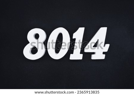 Black for the background. The number 8014 is made of white painted wood.