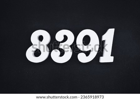 Black for the background. The number 8391 is made of white painted wood.