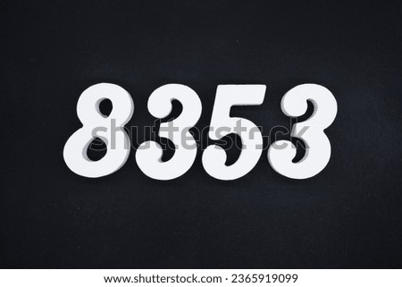 Black for the background. The number 8353 is made of white painted wood.