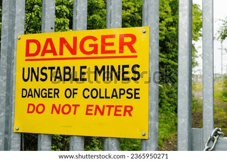 Sign "Danger. Unstable Mines. Danger of Collapse. Do Not Enter"