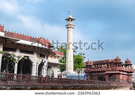 ancient artistic holy jain temple with holy pillar and cloudy sky at morning image is taken at Soni Ji Ki Nasiya Jain Temple, Ajmer, Rajasthan, India.