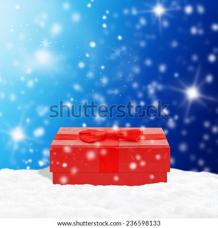 red gift box on snow