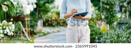 Happy asian woman using tablet at outdoor, Entrepreneur connecting with people