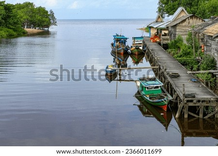 a view of fishermen's village in the morning