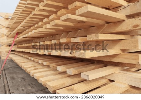 Close-up of variety of wooden pallets for transporting various goods and materials. Wooden pallets.