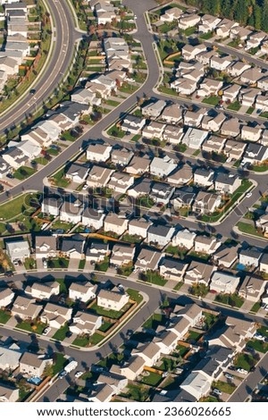 Aerial View of Vibrant Urban Housing Development in 4K Royalty-Free Stock Photo #2366026665