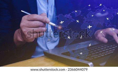 Businessman hand pushing flight booking networking, Hand pressing light blue world map with flight routes airplane, Transportation concept.