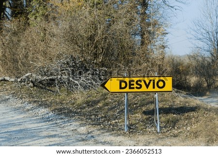 DEVISO - Diversion sign on the forest gravel road in a Spain shows to left