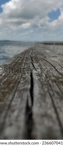 perspective photo.  weathered wood on the dock