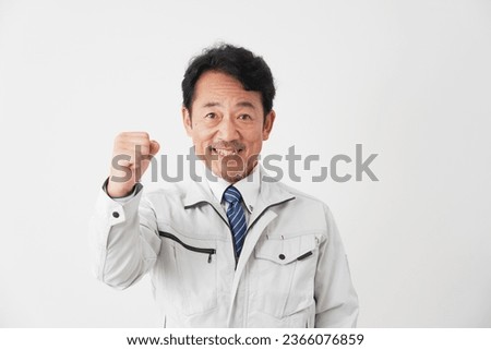 Asian middle aged worke guts pose gesture r in white background