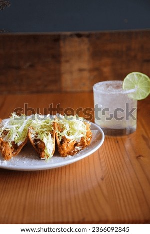 Hard Tacos and a Margarita Royalty-Free Stock Photo #2366092845