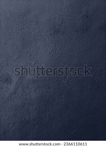 Concrete wall background in dark tones