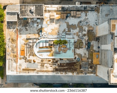 Aerial overhead stock image pool deck under construction