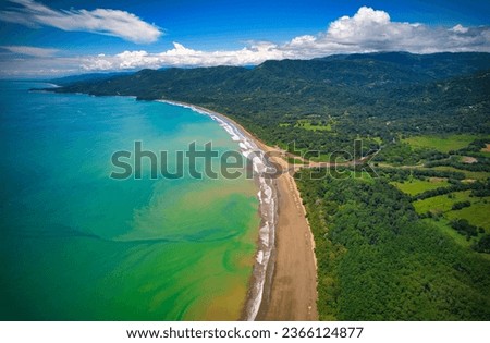 Aerial View of Uvita and national park Bahia Ballena in Costa Rica. Drone picture