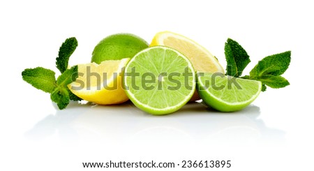 Studio shot of three sliced lemons and limes with mint isolated on a white background 