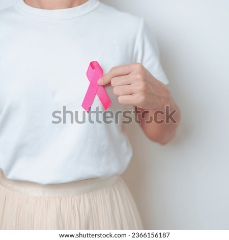 Pink October Breast Cancer Awareness month, woman with pink Ribbon in hospital for support people life and illness. National cancer survivors month, Mother and World cancer day concept Royalty-Free Stock Photo #2366156187