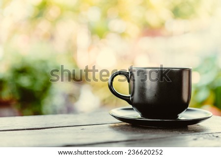 Coffee mug on wooden table - Vintage effect style pictures