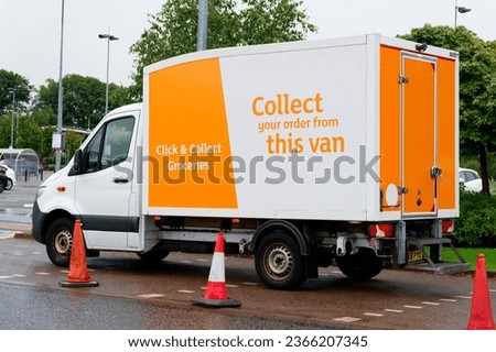 Click and collect van at supermarket car park for online customers