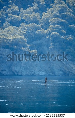 Young girl on the sup